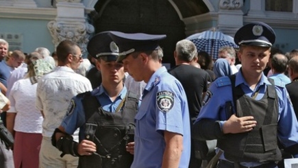 В Киеве неизвестные выстрелили в голову православному священнику