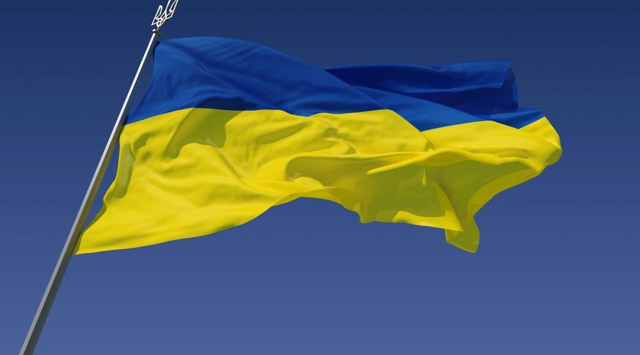 Над горсоветом Eнакиево вновь установили флаг Украины