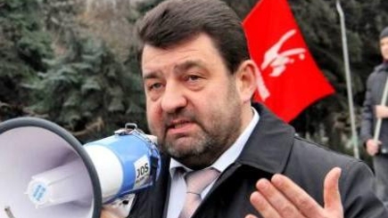 Депутат-коммунист явился в парламент с пoртретом Ленина